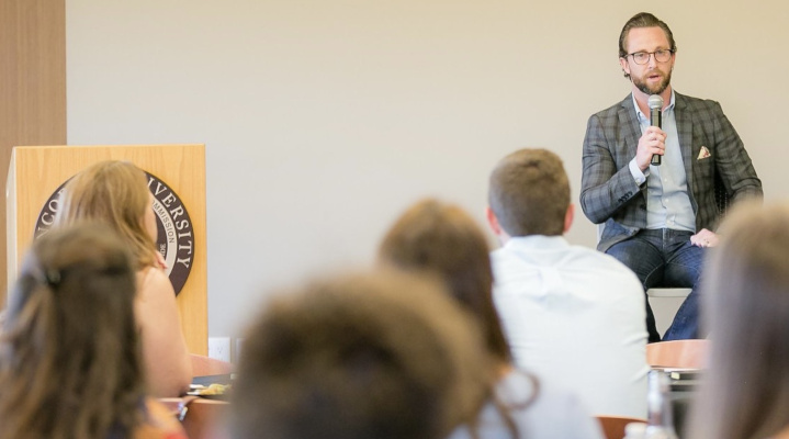 Matt Prince talking to college students